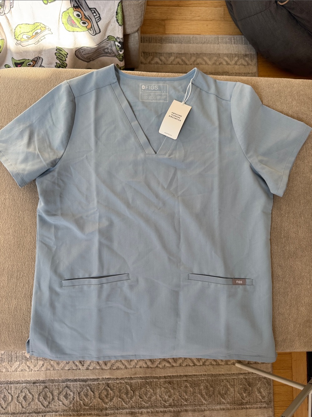 FIGS Women's Casma Three-Pocket Scrub Top in Dusty Blue